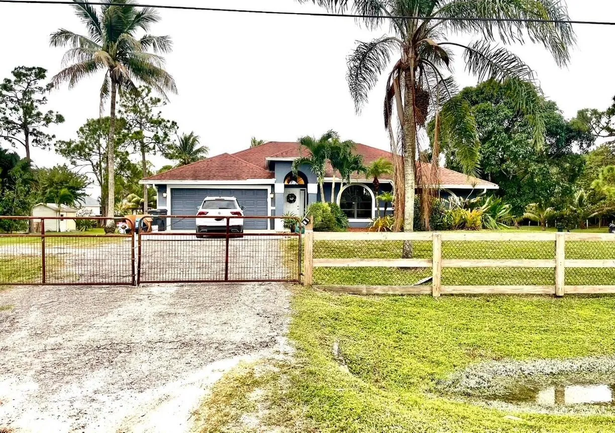 South Florida Real Estate | View 13046 N 49th Street | 3 Beds, 2 Baths