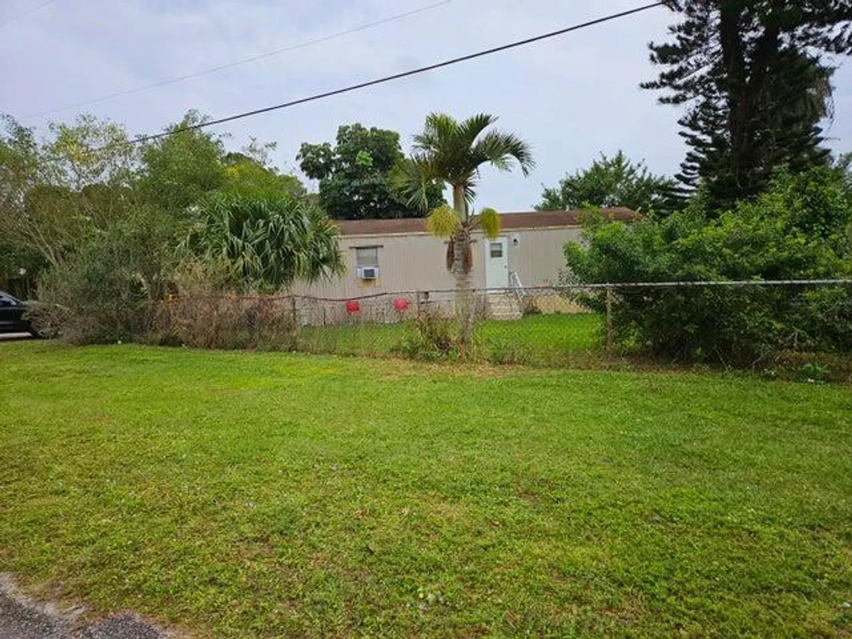 South Florida Real Estate | View 4870 Canal Road | 2 Beds, 1 Bath