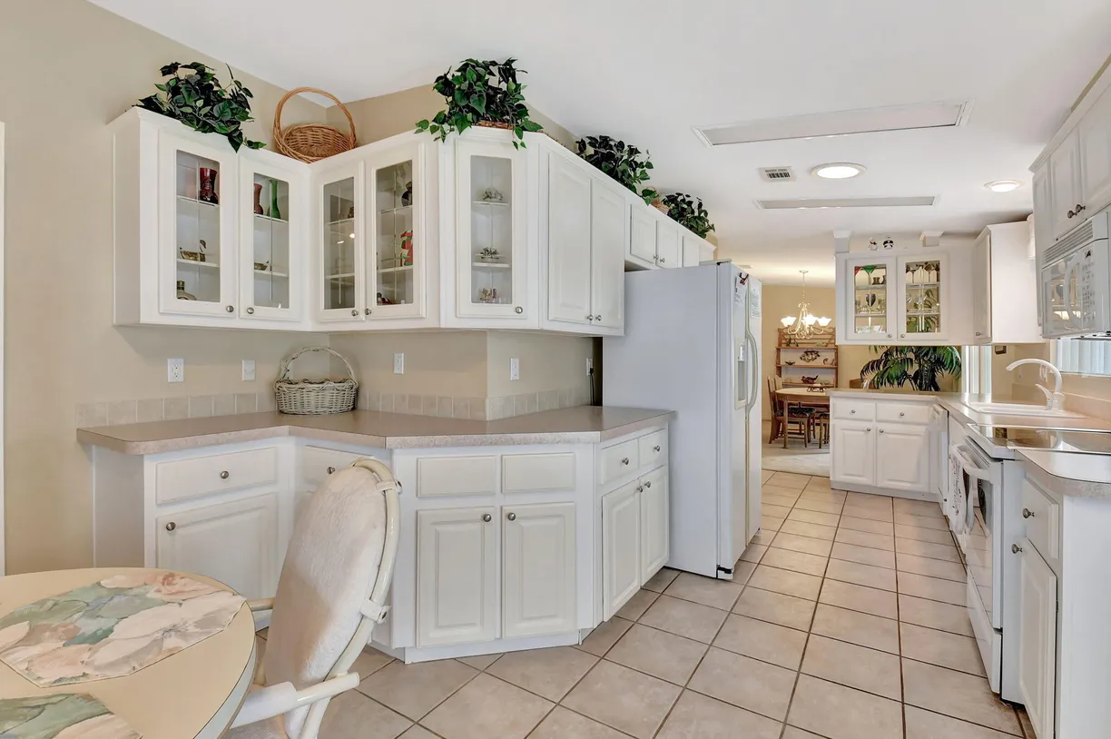 South Florida Real Estate | View 12003 Iguana Bay | 3 Beds, 2 Baths