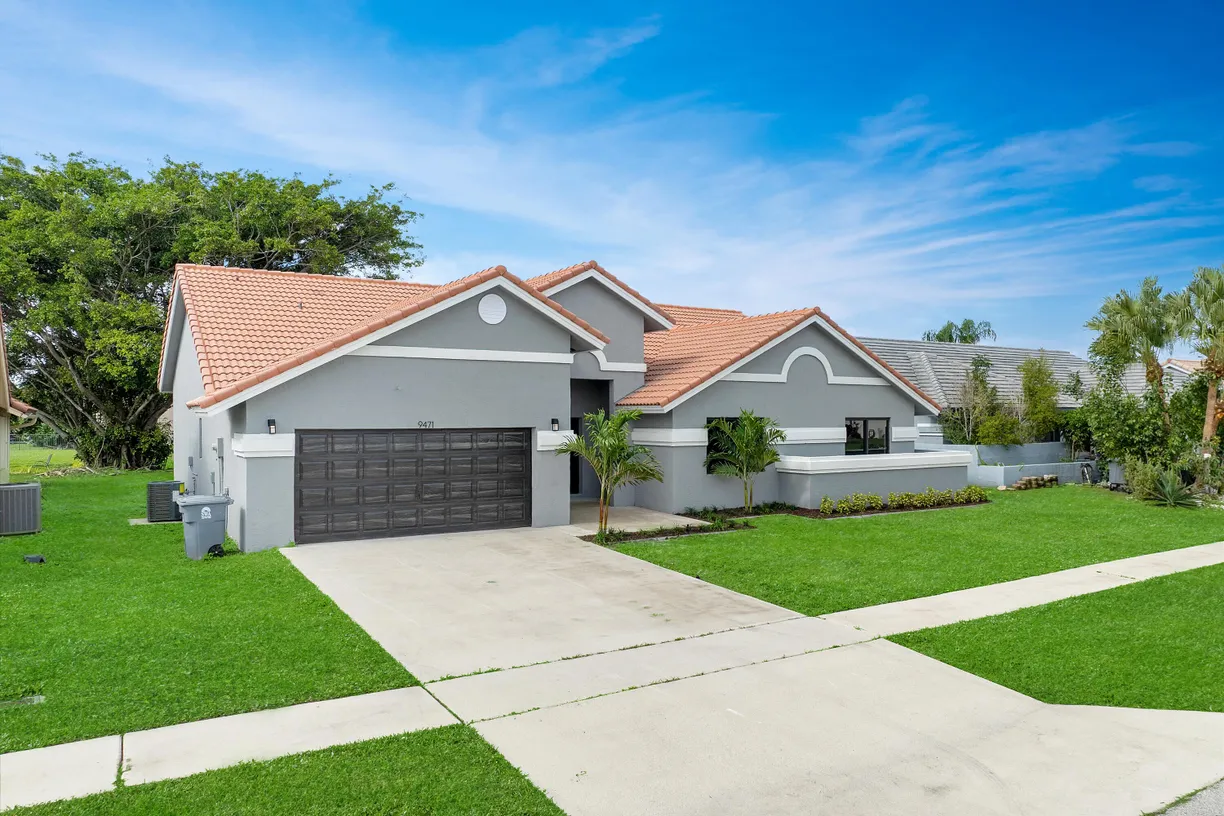 South Florida Real Estate | View 9471 Sun Pointe Drive | 4 Beds, 2 Baths
