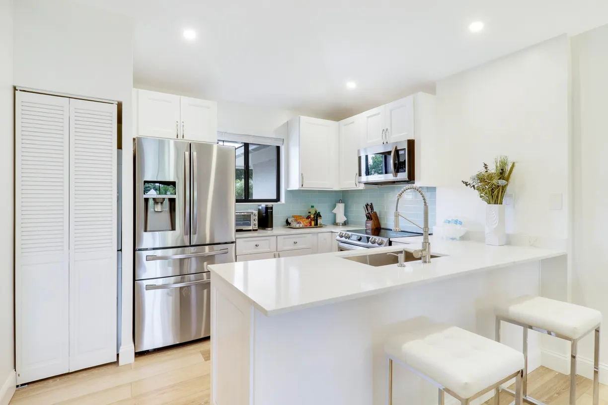 South Florida Real Estate | View 302 Club Drive | 2 Beds, 2 Baths
