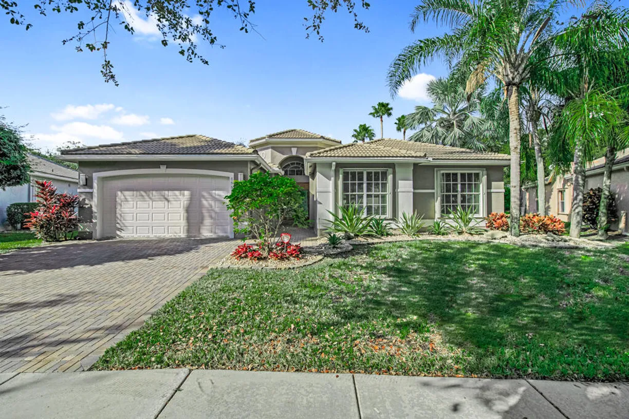 South Florida Real Estate | View 7757 Royale River Lane | 4 Beds, 2 Baths
