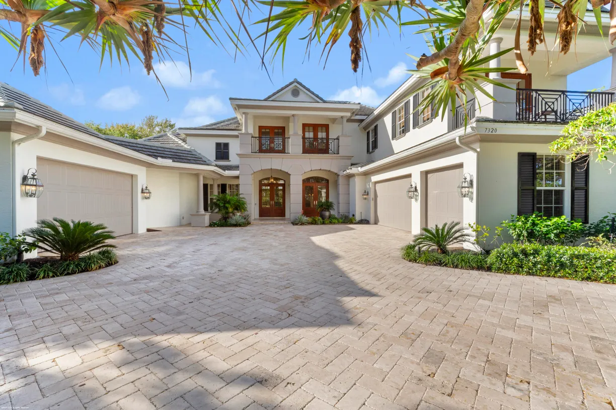 South Florida Real Estate | View 7320 SE Medalist Place | 5 Beds, 6 Baths