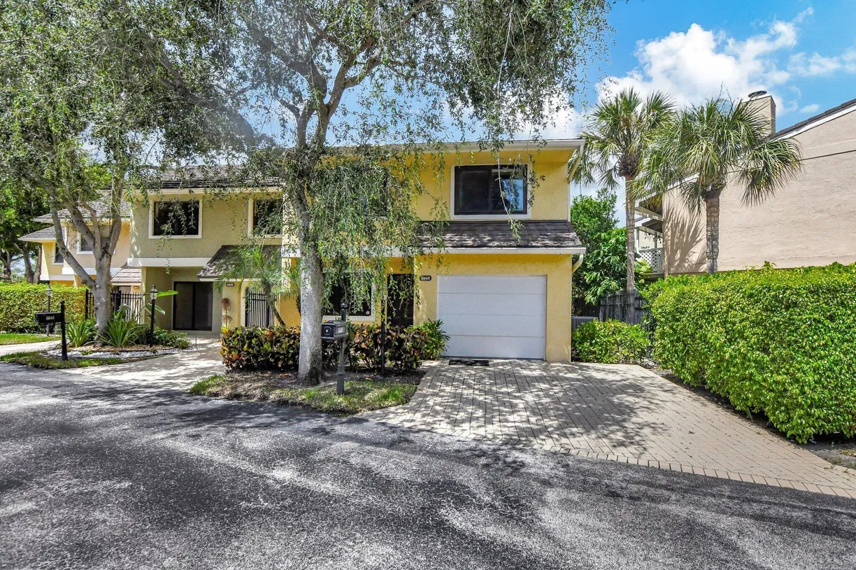 South Florida Real Estate | View 5648 Santiago Circle | 3 Beds, 3 Baths