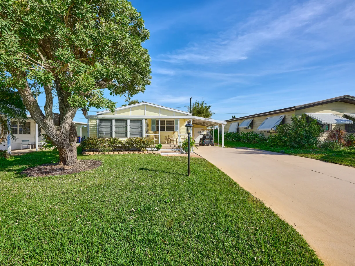 South Florida Real Estate | View 8217 SE Swan Avenue | 2 Beds, 2 Baths