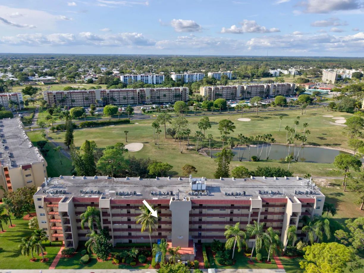 South Florida Real Estate | View 3810 Via Poinciana, 404 | 2 Beds, 2 Baths
