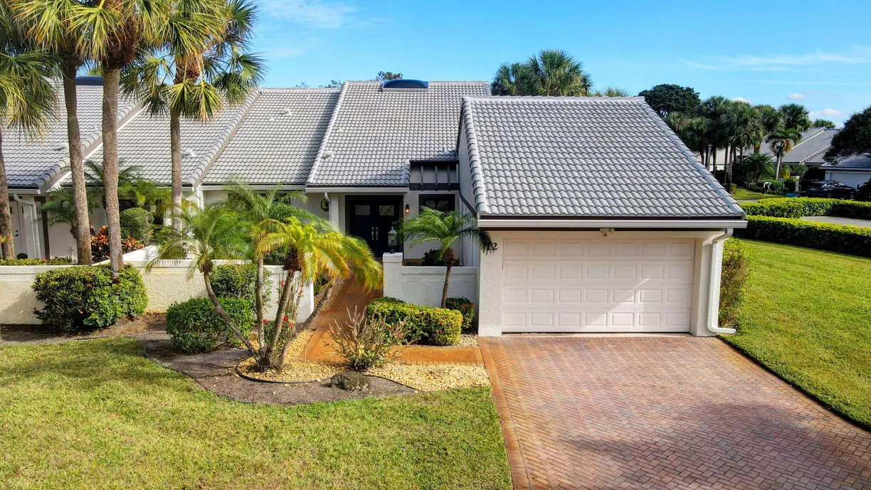South Florida Real Estate | View 12 Clubhouse Lane | 2 Beds, 2 Baths