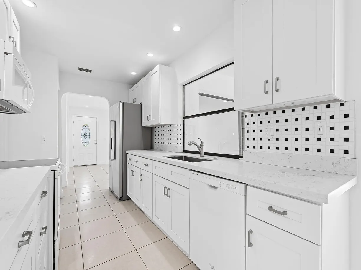South Florida Real Estate | View 14718 Shadow Wood Lane | 2 Beds, 2 Baths