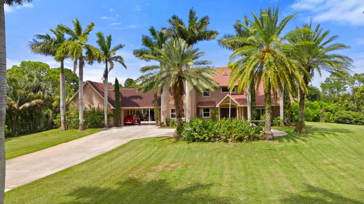 South Florida Real Estate | View 14410 64th Way | 5 Beds, 4 Baths