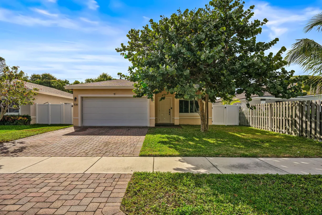 South Florida Real Estate | View 330 Reigle Avenue | 3 Beds, 2 Baths