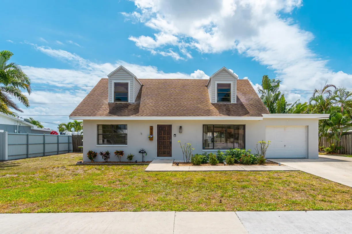 South Florida Real Estate | View 337 Cypress Lane | 4 Beds, 2 Baths