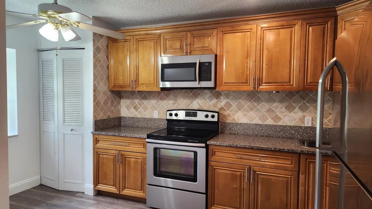 South Florida Real Estate | View 164 Meadows Drive | 3 Beds, 2 Baths