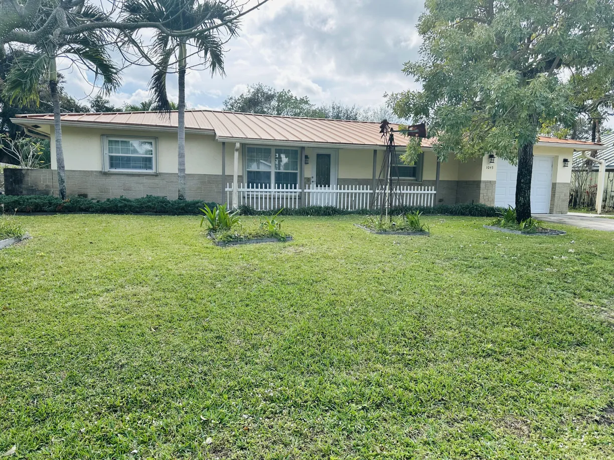 South Florida Real Estate | View 1043 Coral Drive | 3 Beds, 2 Baths