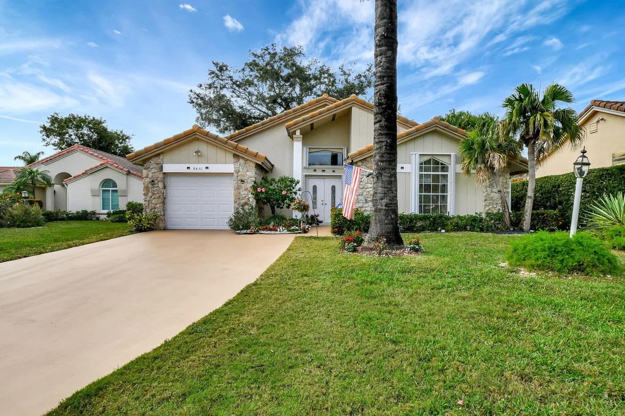 South Florida Real Estate | View 8451 Compass Drive | 2 Beds, 2 Baths