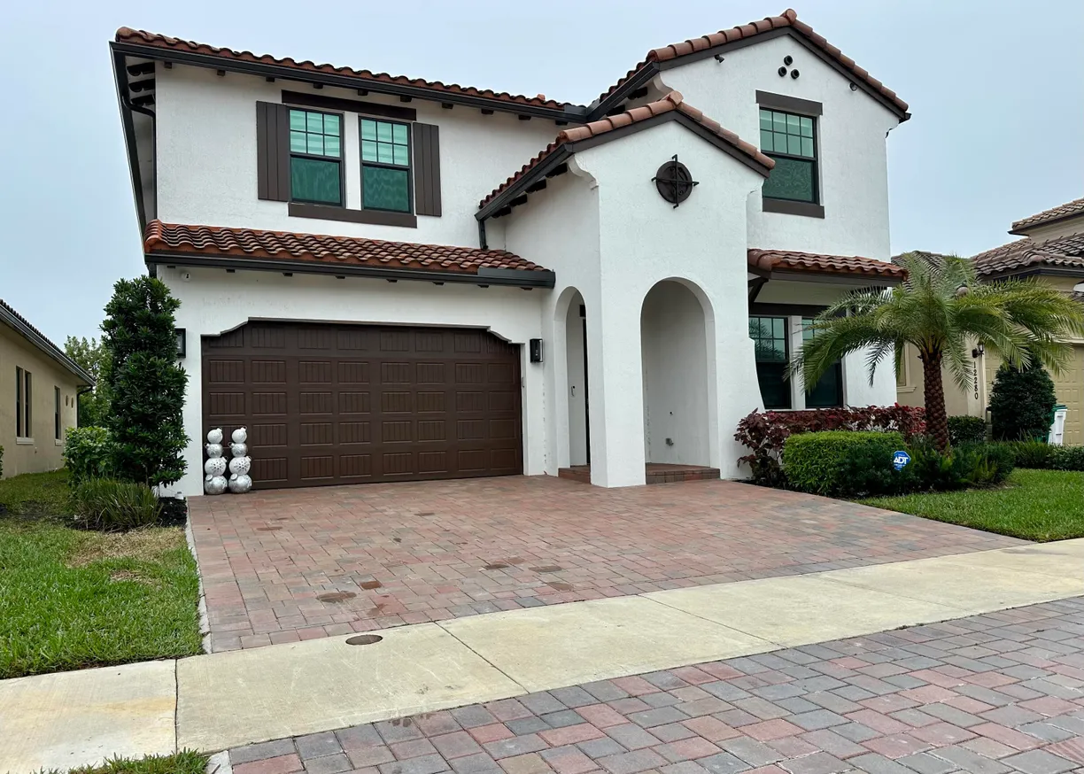 South Florida Real Estate | View 12270 N Baypoint Circle | 4 Beds, 3 Baths