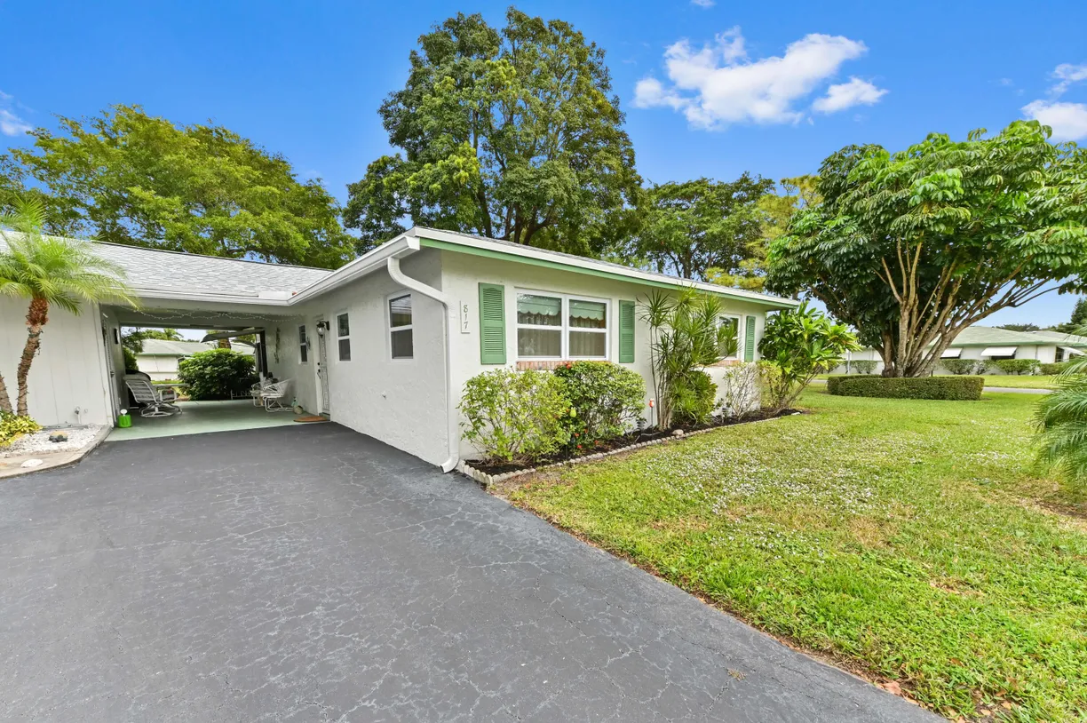 South Florida Real Estate | View 817 Meadowlark Lane | 2 Beds, 2 Baths