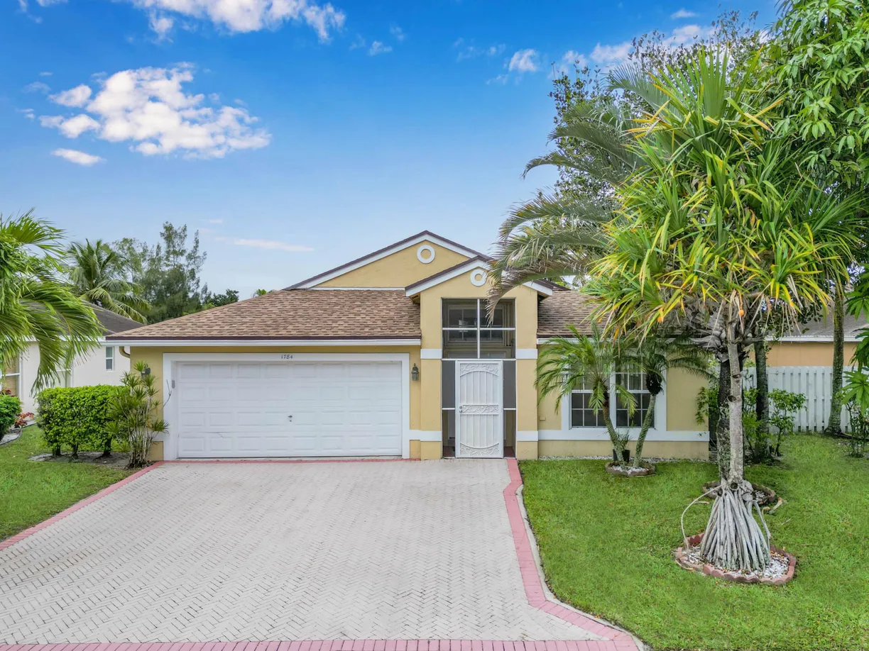 South Florida Real Estate | View 1784 Sawgrass Circle | 3 Beds, 2 Baths