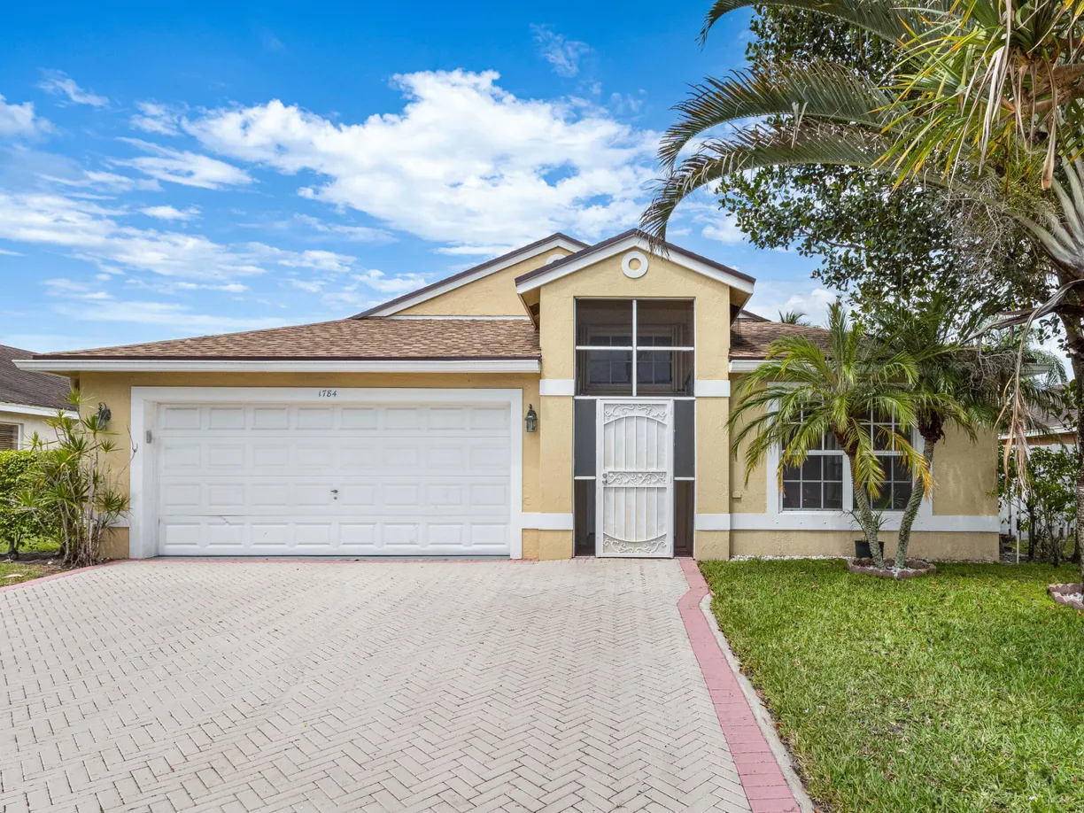 South Florida Real Estate | View 1784 Sawgrass Circle | 3 Beds, 2 Baths