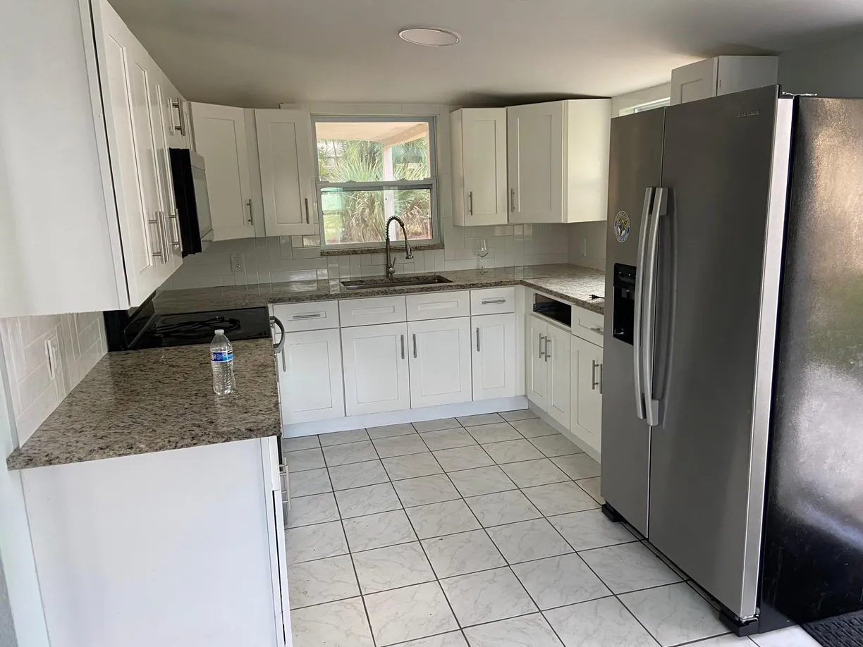 South Florida Real Estate | View 7157 S Military Trail | 4 Beds, 3 Baths