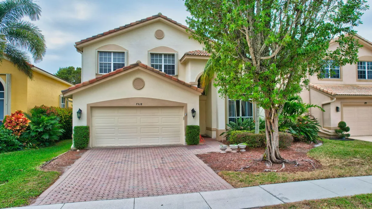 South Florida Real Estate | View 7518 Colony Lake Drive | 4 Beds, 2 Baths