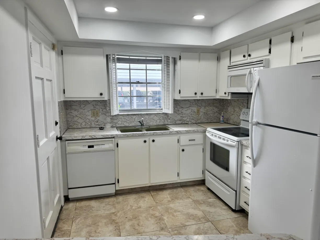 South Florida Real Estate | View 907 Marina Drive, 107 | 2 Beds, 2 Baths