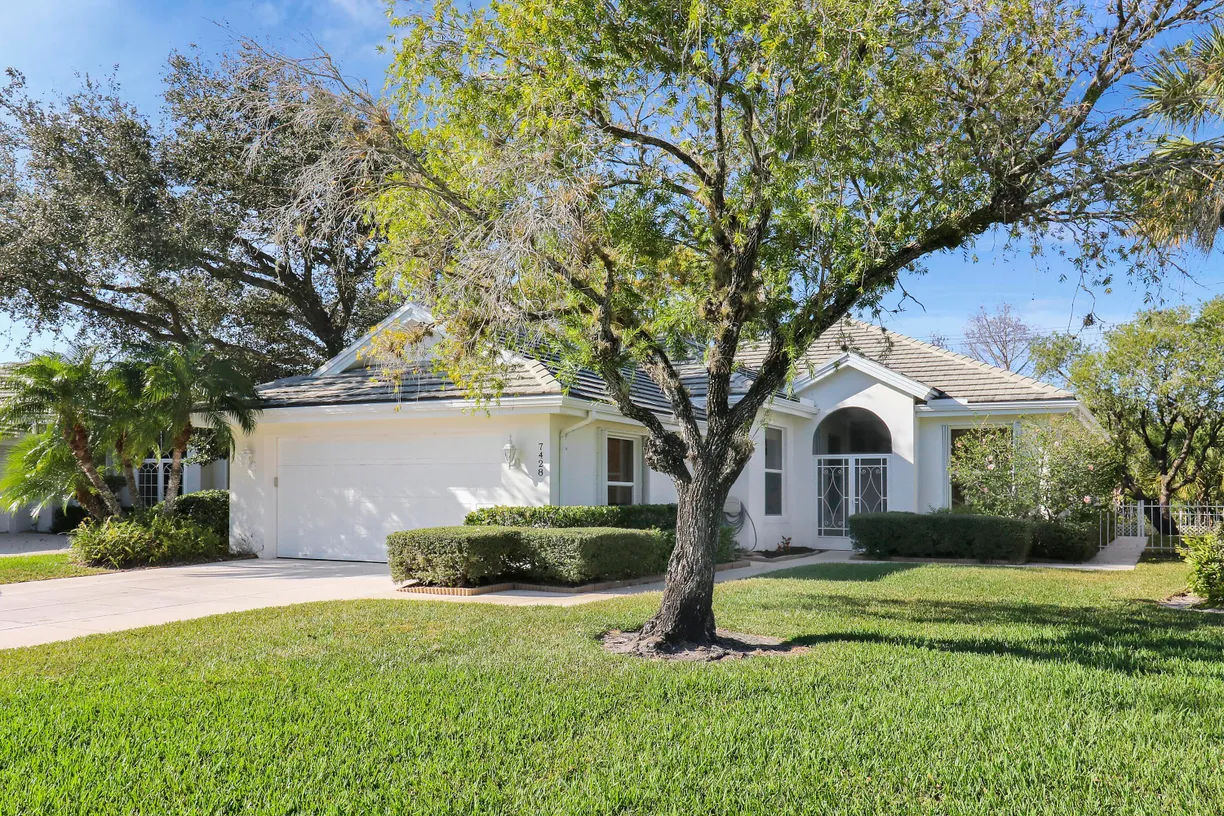 South Florida Real Estate | View 7428 SE Waxberry Circle | 3 Beds, 2 Baths