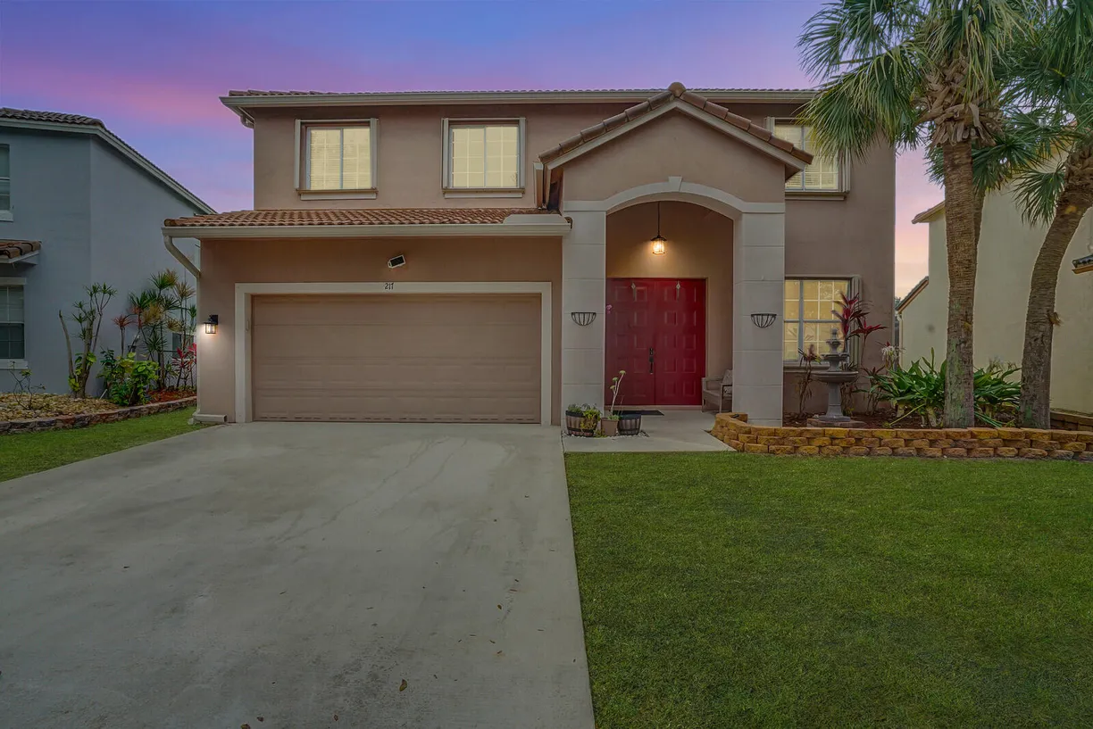 South Florida Real Estate | View 217 Seminole Lakes Drive | 4 Beds, 2 Baths