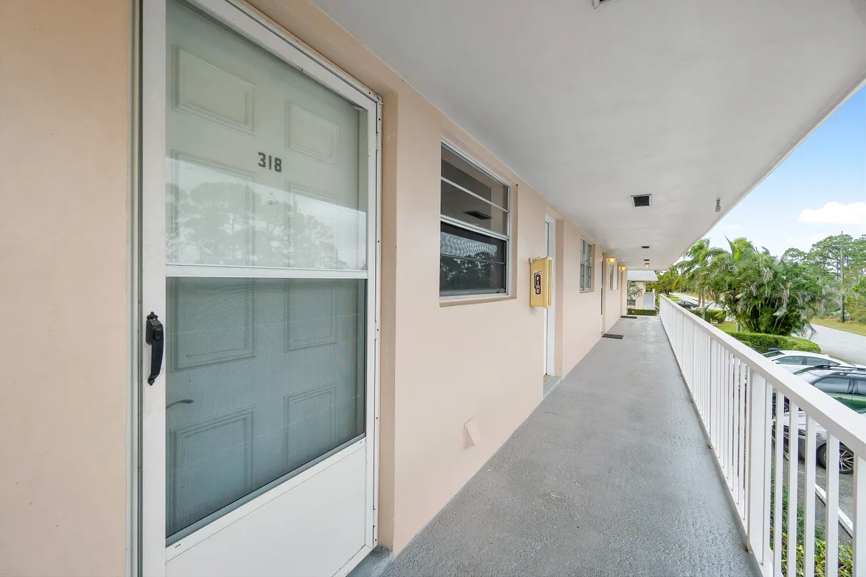 South Florida Real Estate | View 18081 SE Country Club Drive, Bldg 32 Unit 318 | Listing