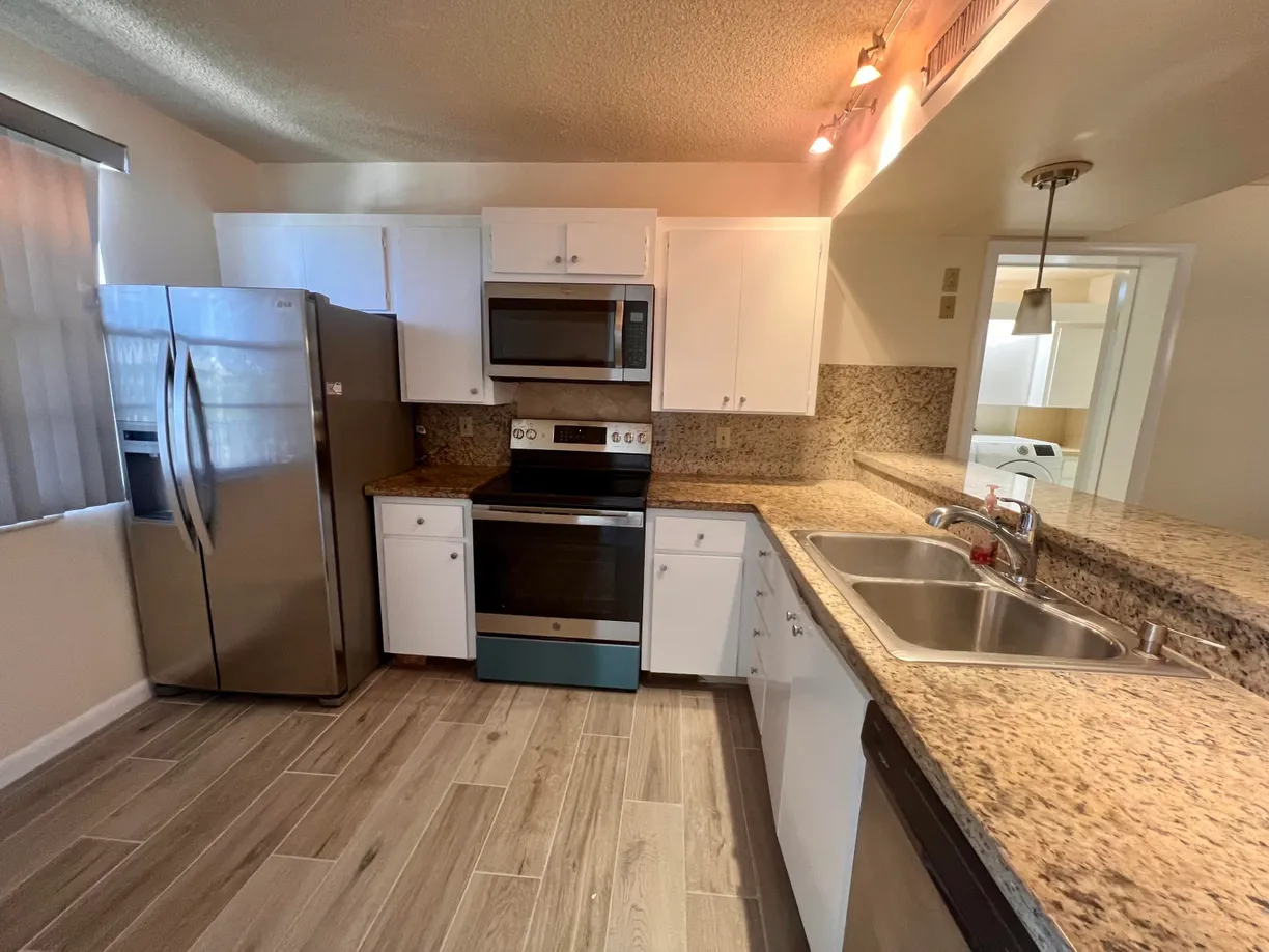 South Florida Real Estate | View 3515 Village Boulevard, 402 | 2 Beds, 2 Baths