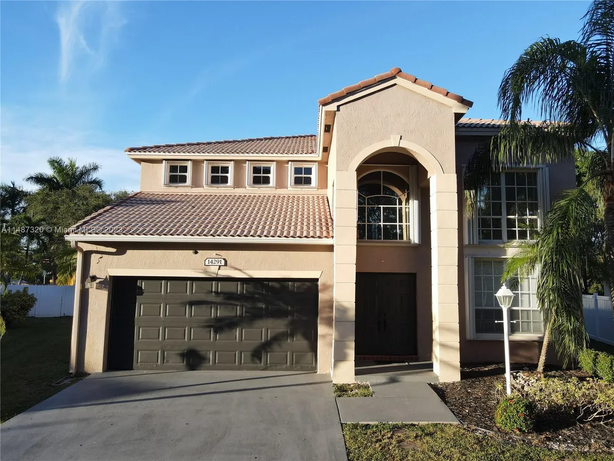 South Florida Real Estate | View 14291 NW 23rd Street | 4 Beds, 3 Baths
