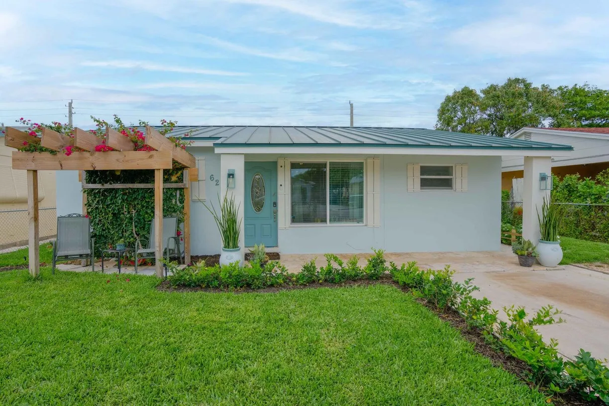 South Florida Real Estate | View 625 59th Street | 3 Beds, 2 Baths