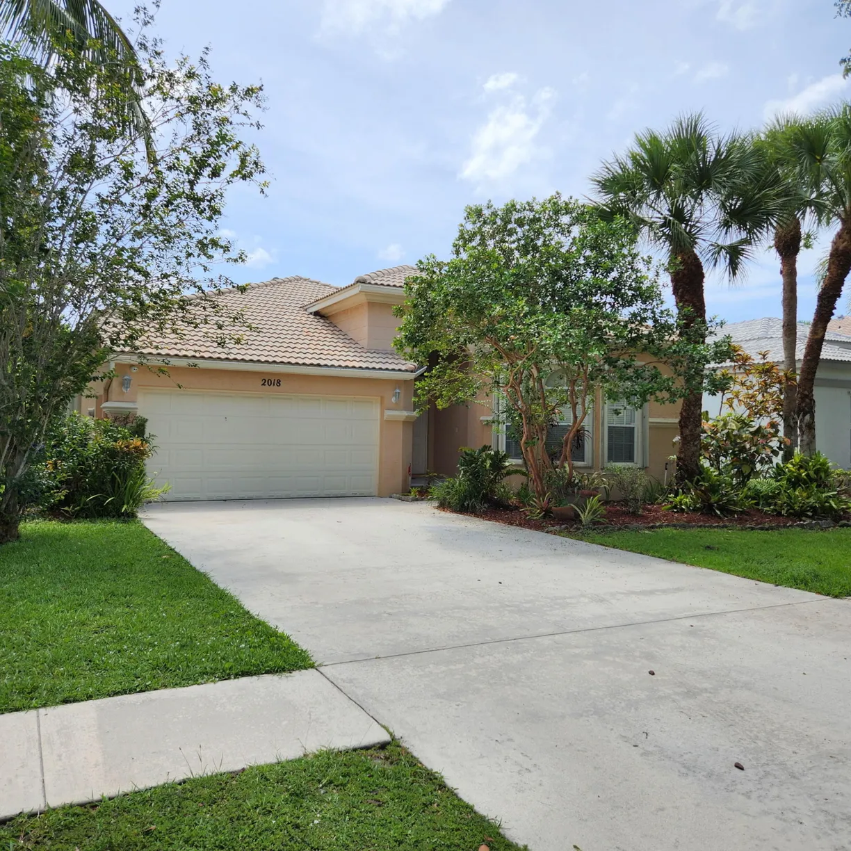 South Florida Real Estate | View 2018 Reston Circle | 3 Beds, 2 Baths