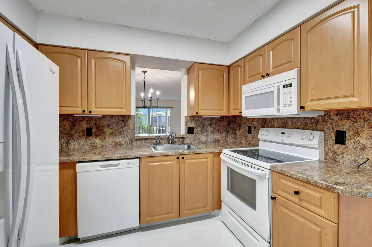 South Florida Real Estate | View 6585 Kensington Lane, 408 | 2 Beds, 2 Baths
