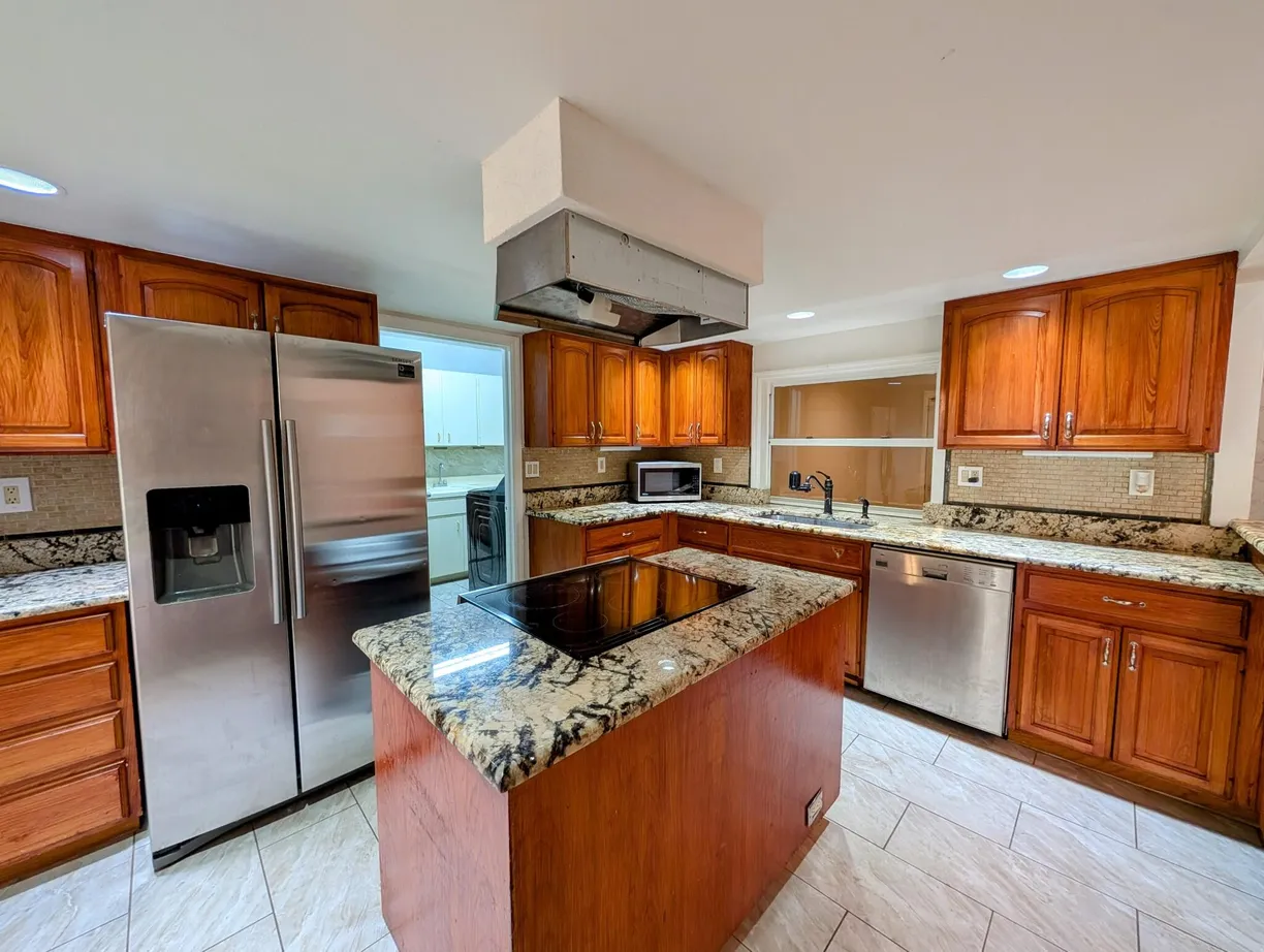 South Florida Real Estate | View 12523 Tangerine Boulevard | 4 Beds, 3 Baths