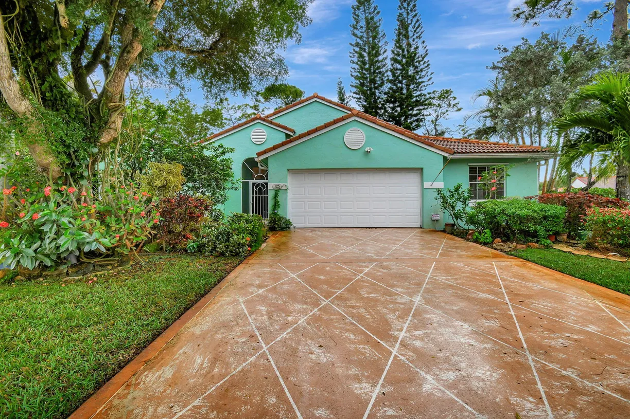South Florida Real Estate | View 125 Egret Circle | 3 Beds, 2 Baths