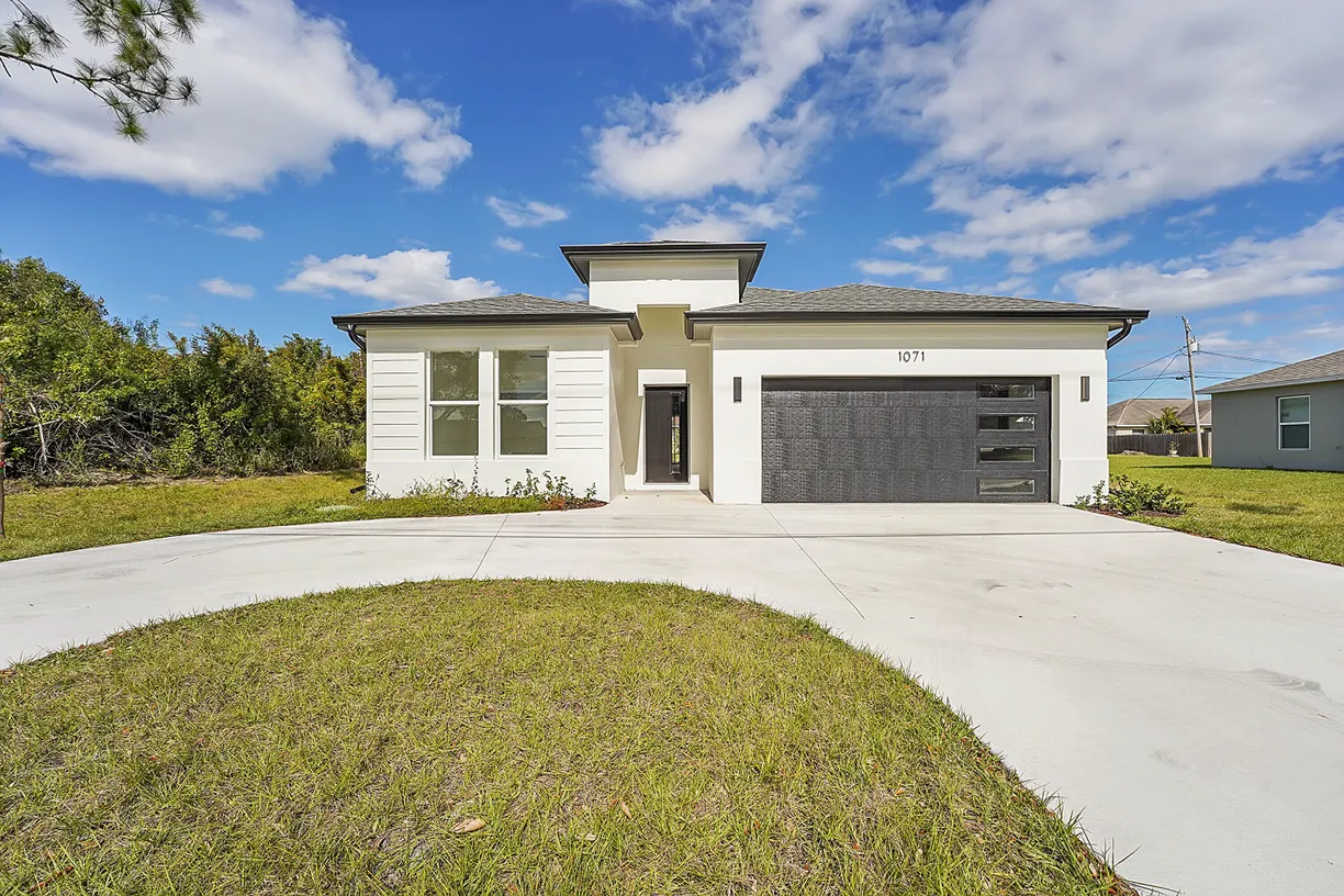 South Florida Real Estate | View 1071 SW Becker Road | 4 Beds, 2 Baths