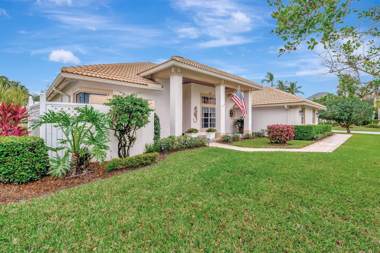 South Florida Real Estate | View 7983 SE Osprey Street | 4 Beds, 3 Baths