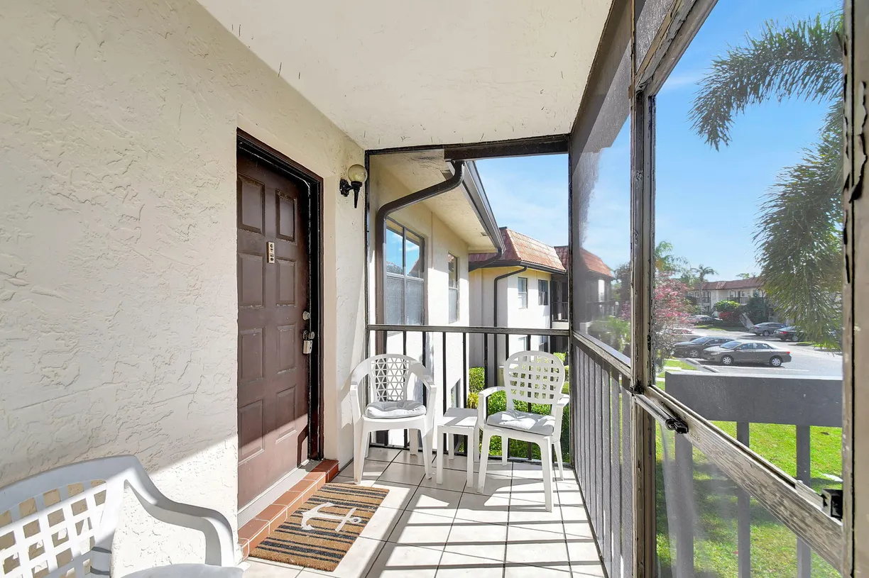South Florida Real Estate | View 7166 Golf Colony Court, 203 | Listing