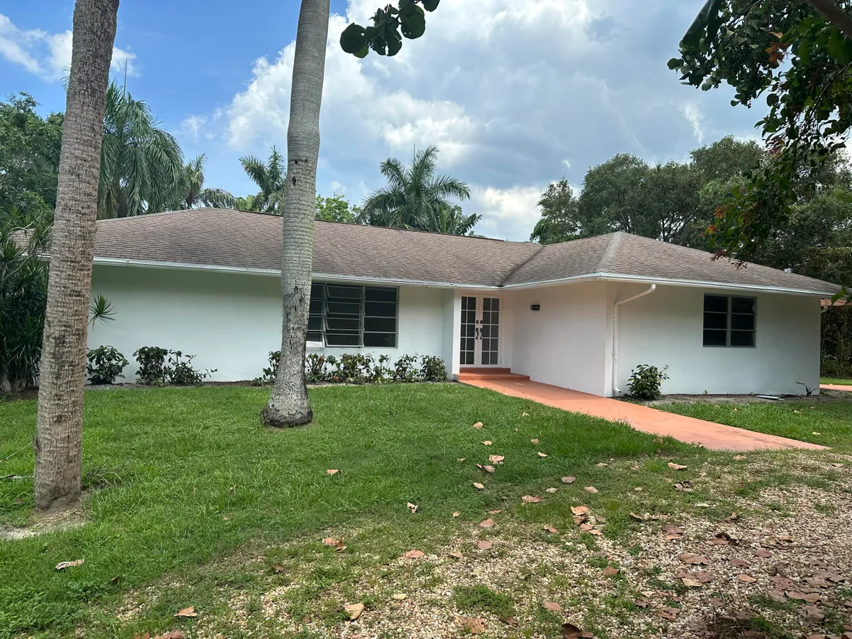 South Florida Real Estate | View 1 Indialucie Parkway | 3 Beds, 2 Baths