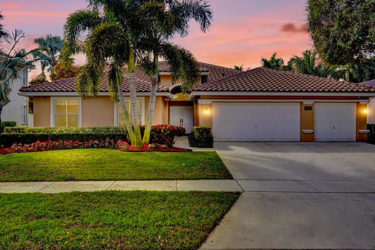 South Florida Real Estate | View 5568 Lake Shore Village Circle | 4 Beds, 2 Baths