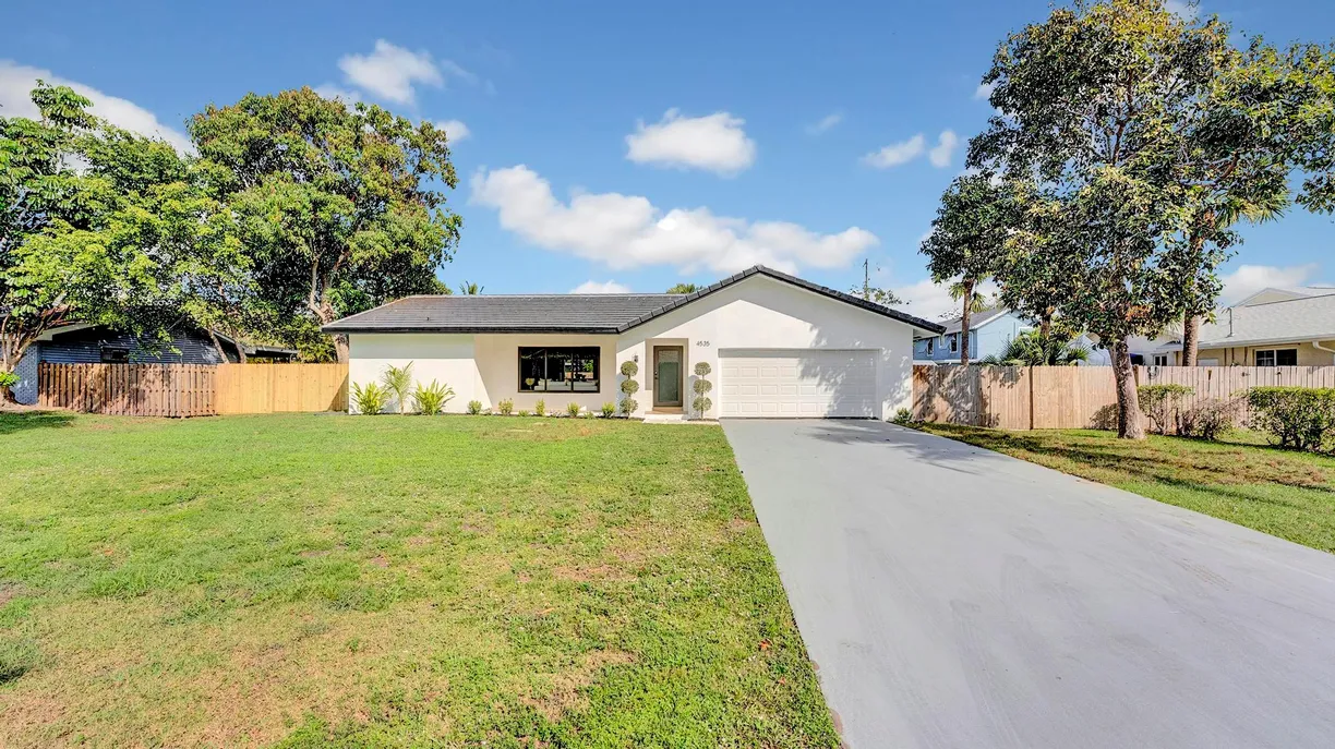South Florida Real Estate | View 4535 Palm Ridge Boulevard | 3 Beds, 2 Baths