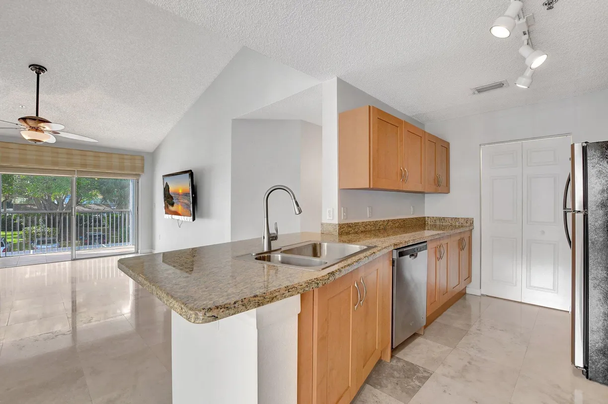 South Florida Real Estate | View 3209 Clint Moore Road, 207 | 2 Beds, 2 Baths