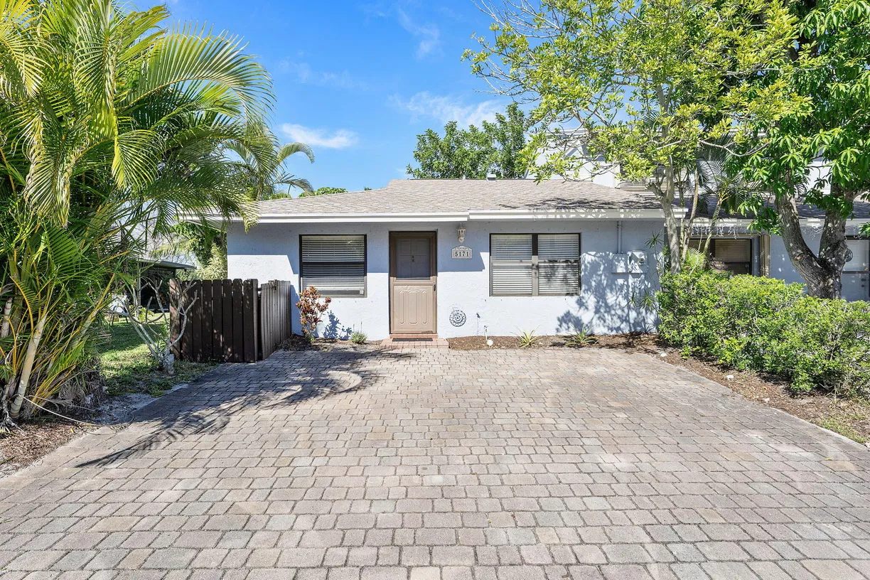 South Florida Real Estate | View 5171 Tennis Lane | 2 Beds, 2 Baths