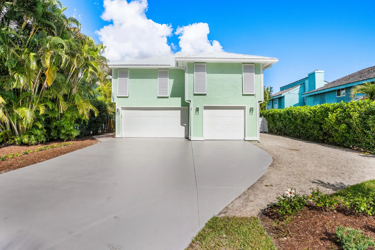South Florida Real Estate | View 4239 SE Whiticar Way | 4 Beds, 3 Baths