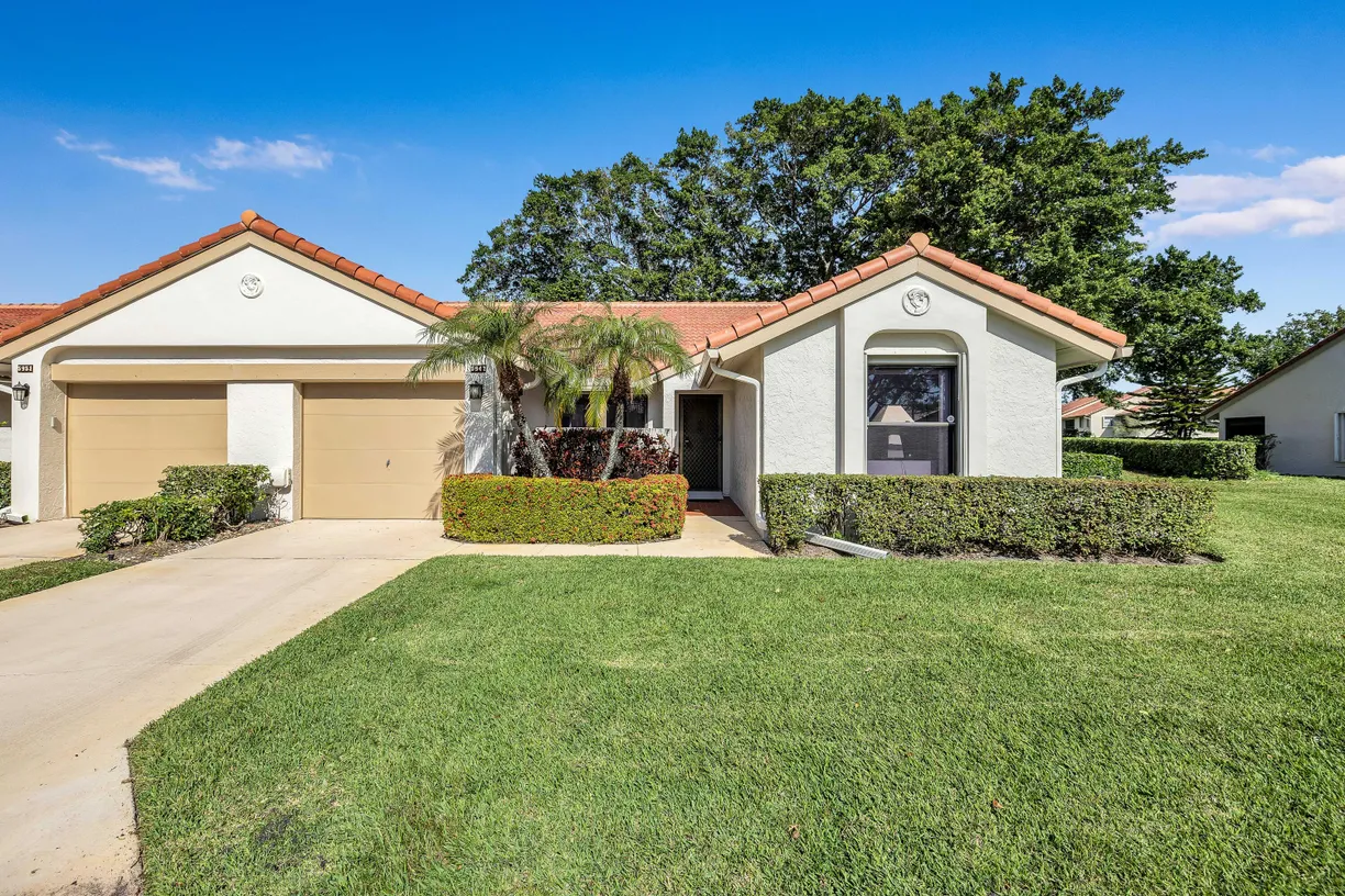 South Florida Real Estate | View 5947 Parkwalk Circle | 3 Beds, 2 Baths