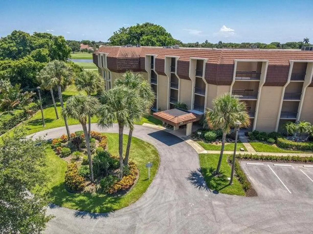 South Florida Real Estate | View 5350 Woodland Lakes Drive, 209 | Listing