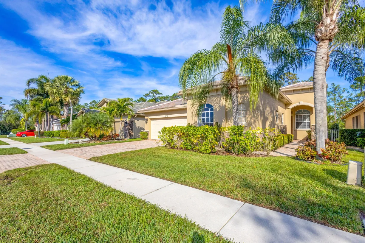 South Florida Real Estate | View 9774 Osprey Isles Boulevard | 4 Beds, 3 Baths