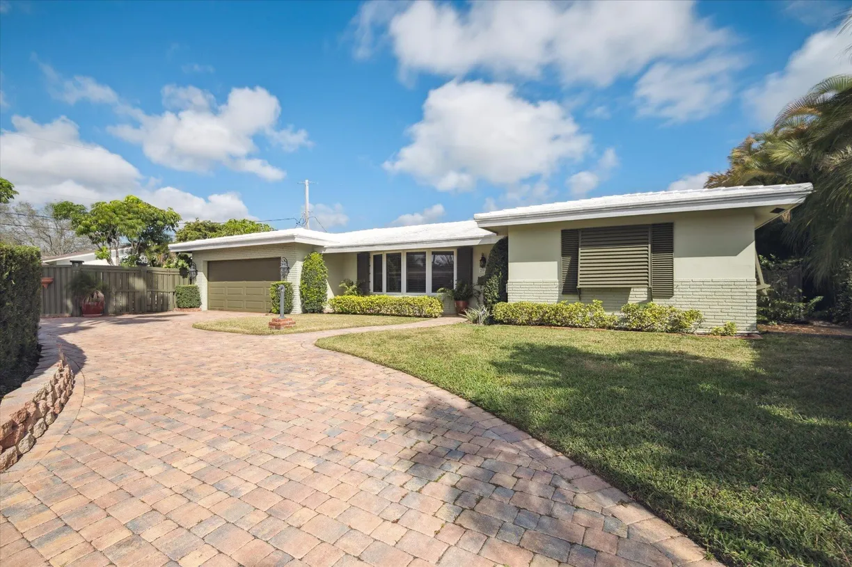 South Florida Real Estate | View 2061 NE 54th Street | 4 Beds, 3 Baths