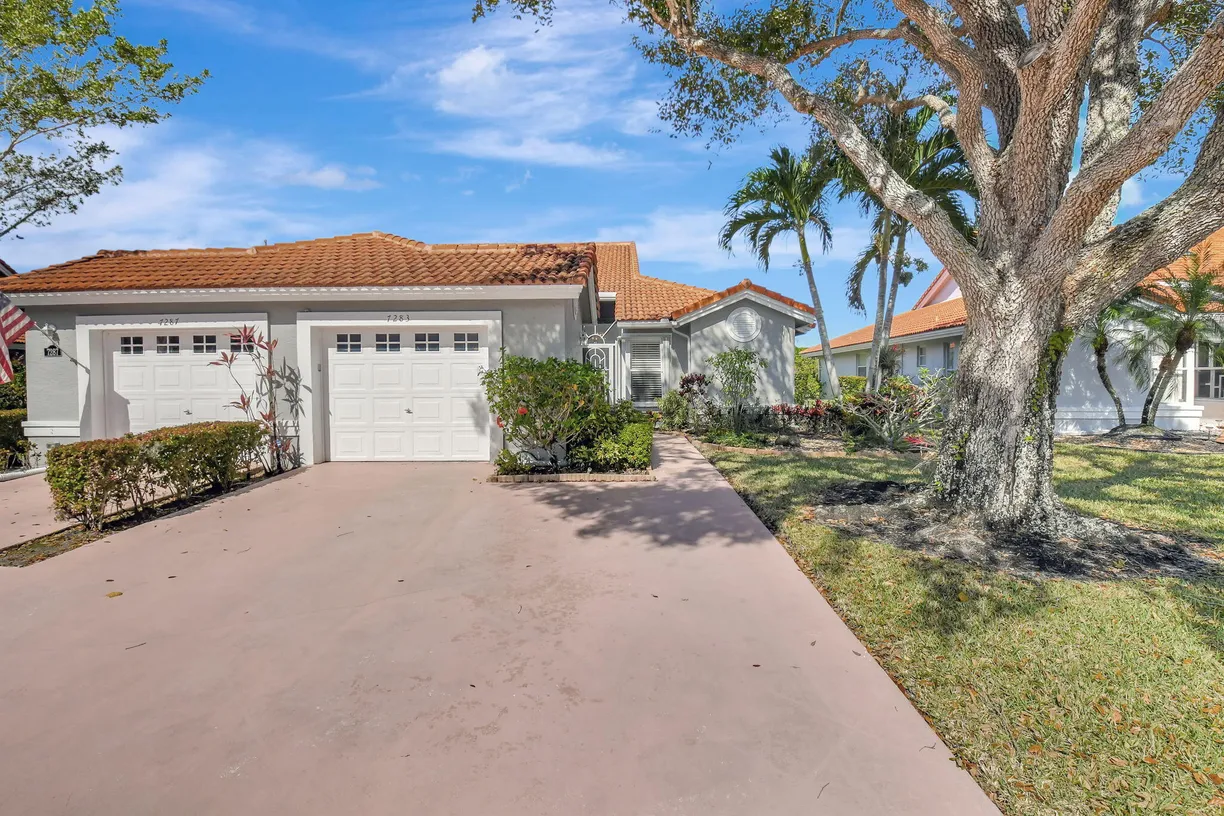 South Florida Real Estate | View 7283 Summer Tree Drive | 2 Beds, 2 Baths