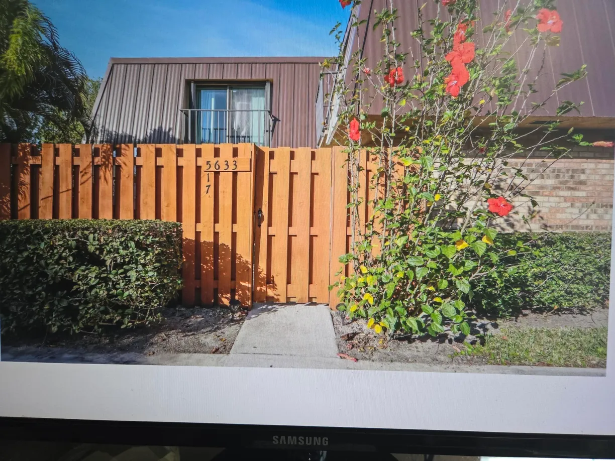 South Florida Real Estate | View 5633 SE Windsong Lane | 2 Beds, 2 Baths